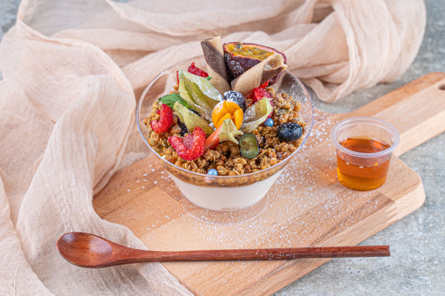 Serving Dubai chocolate yogurt topped with crispy kataifi and pistachios