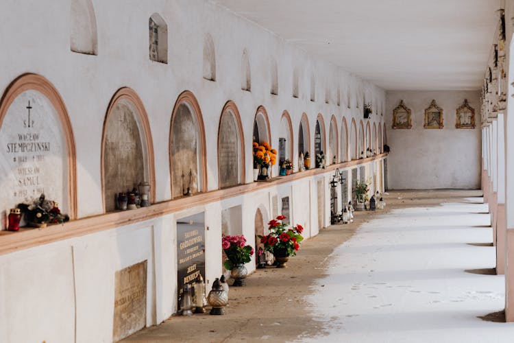 Tombstones Embedded In Wall