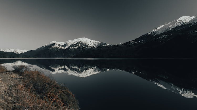 Lake Near Snow Covered Mountain