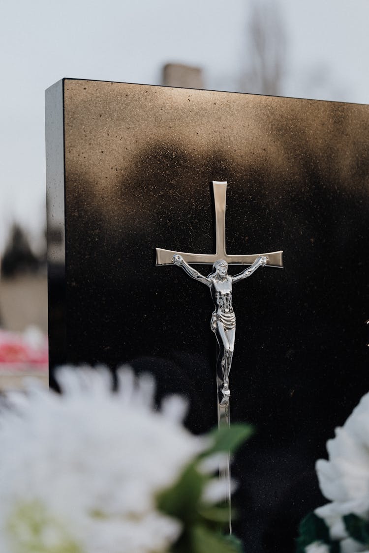 Crucifix On A Black Wall