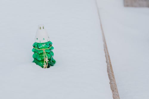 Green Candle Holder on Snow