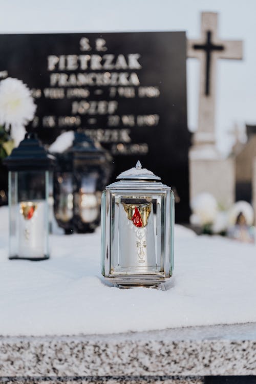  Clear Glass Candle Holders on Snow Covered Tomb