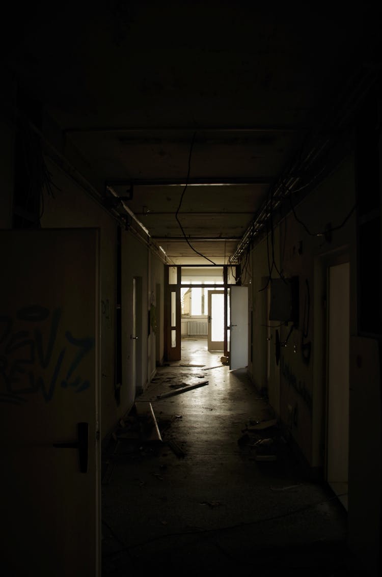 Abandoned Building With Dark Hallway 