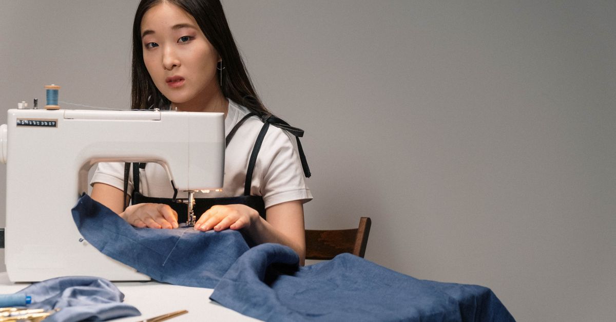 Portrait of Woman Sewing · Free Stock Photo