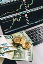 Silver Round Coins on Macbook Pro
