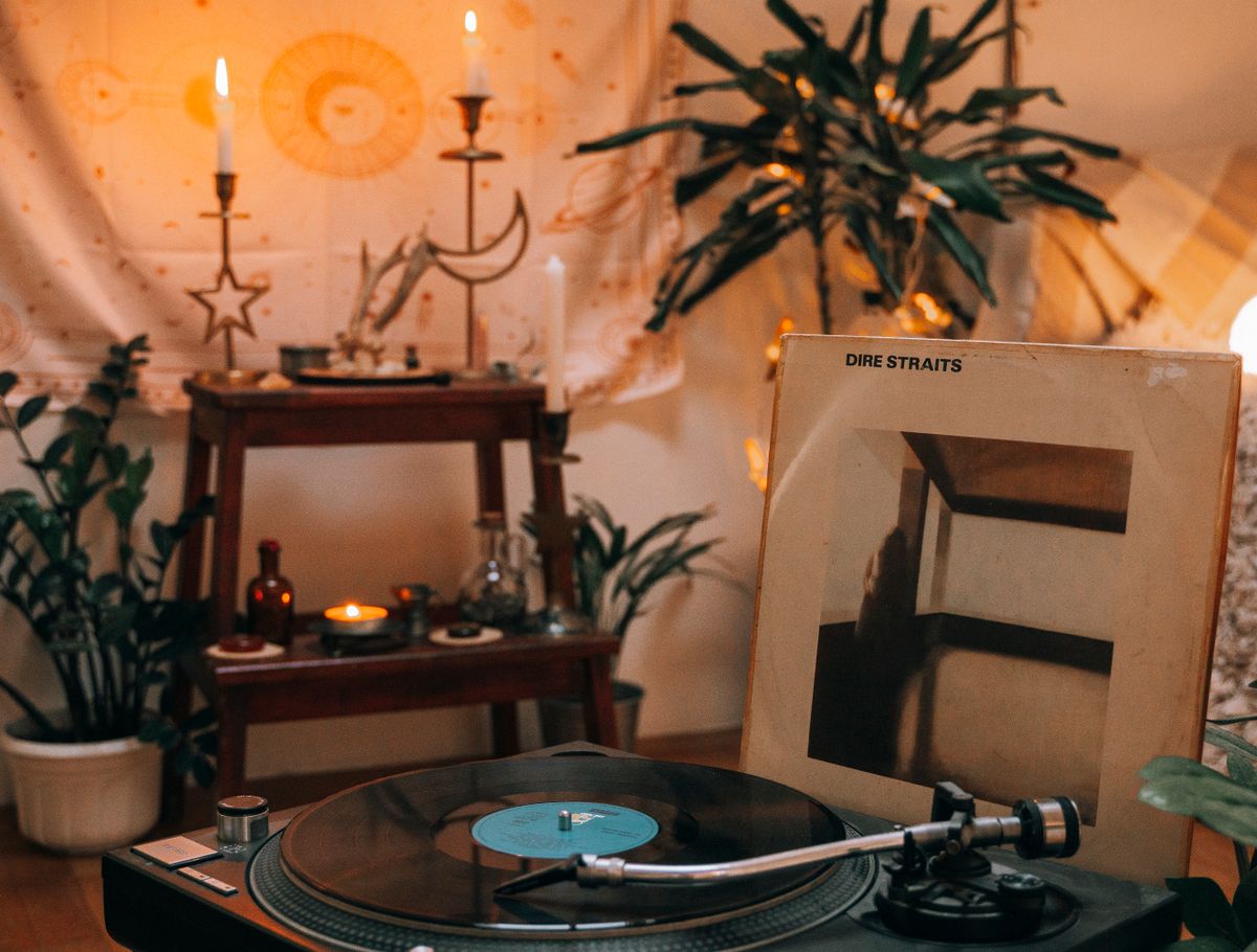 Warm vintage living room corner with turntable and indoor plants