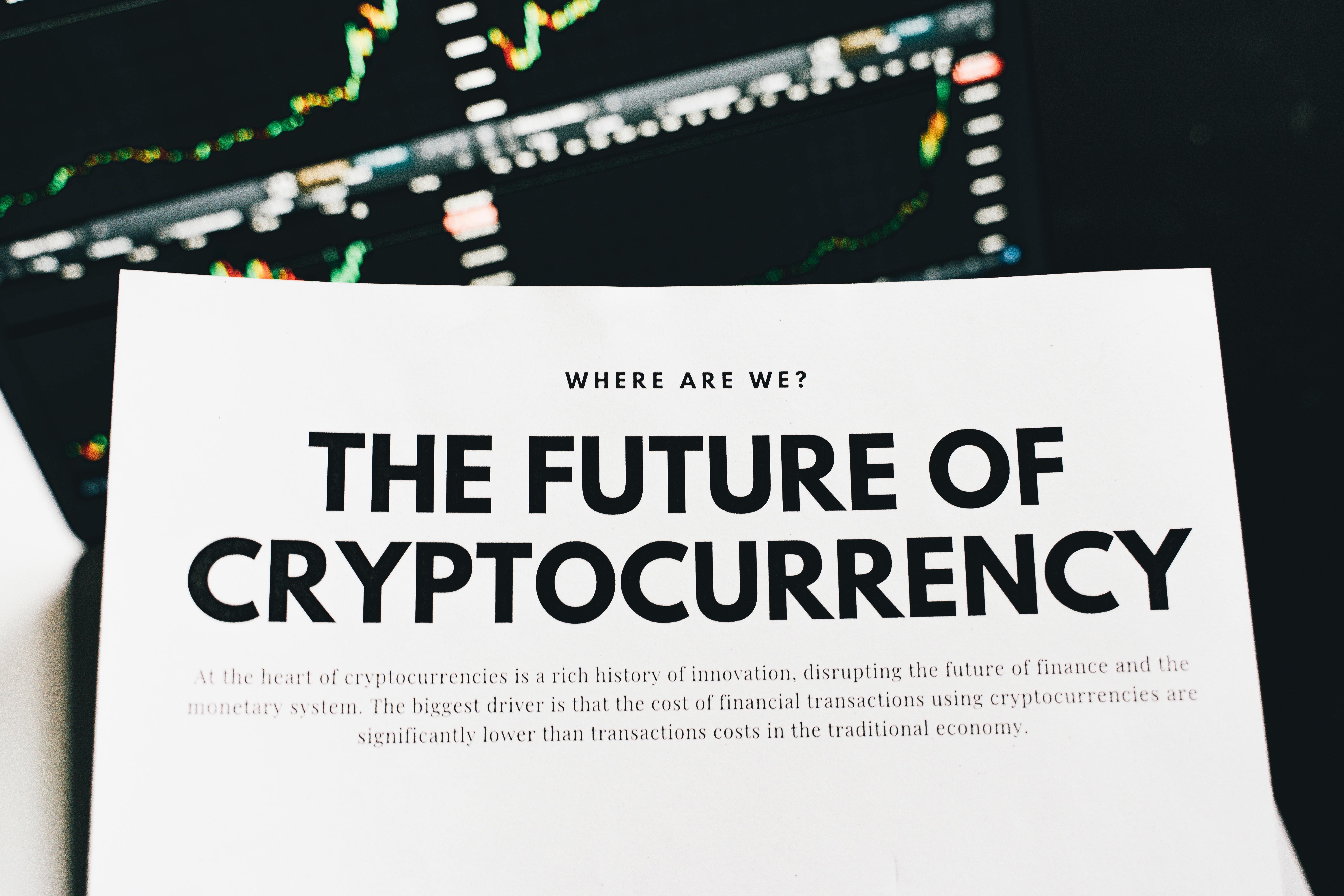 A Cryptocurrency Advertisement on White Paper · Free Stock Photo