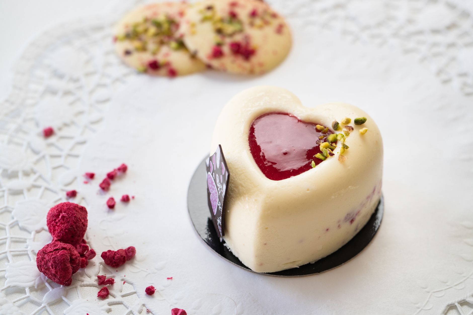 Orange blossom blondie ice cream with raspberry white chocolate shell