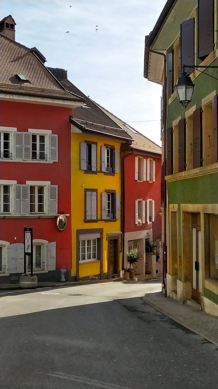 Colorful Houses On A Street In A Town