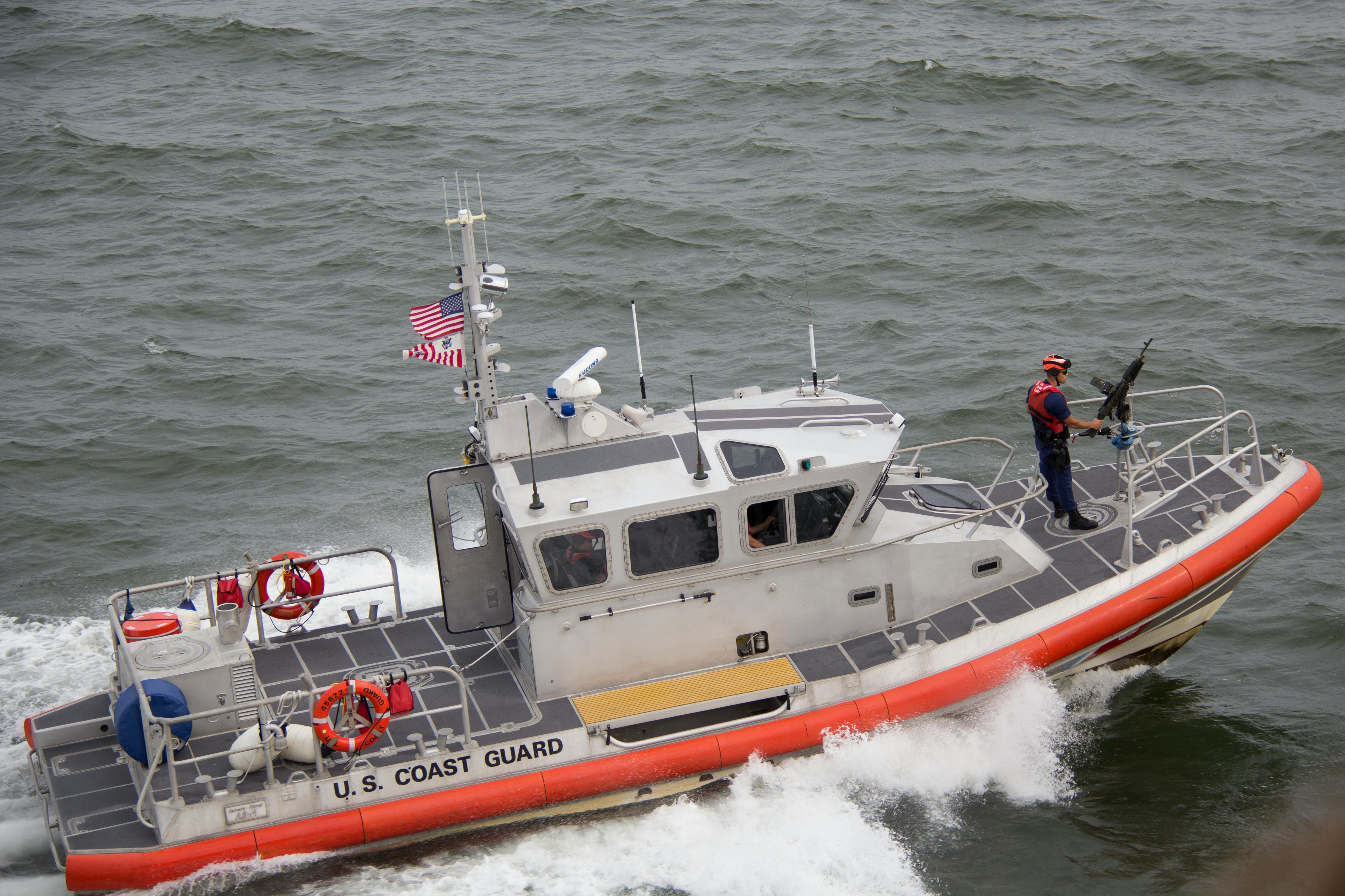 White Orange U.S. Coast Guard Boat on the Sea · Free Stock Photo