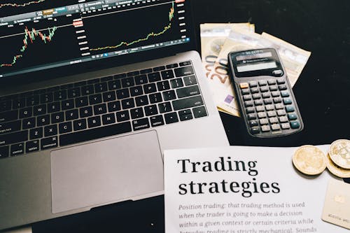 Research Paper on Trading Strategies Beside Calculator and Laptop