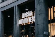 White Store Signage on a Building