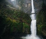 Waterfall flowing through rocky ravine