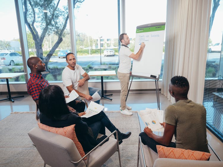 Office Team Having Discussion In The Room