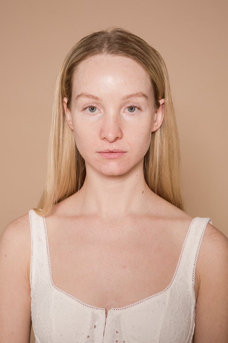 Serious Woman With Natural Appearance In Studio