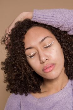 Stylish ethnic woman with colored liner