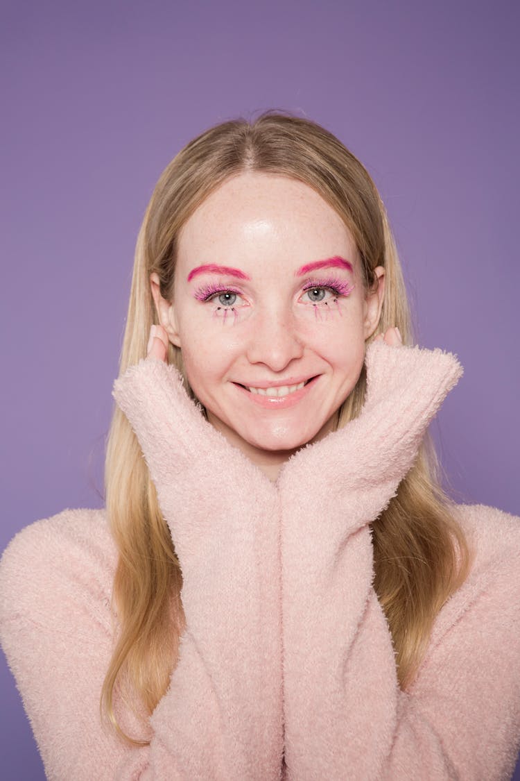 Smiling Lady In Colorful Makeup On Face In Studio