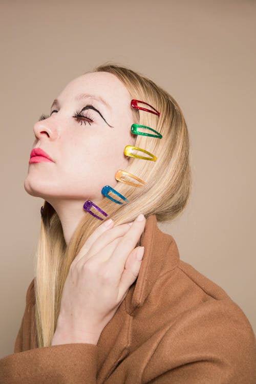 Extraordinary woman with bright hair clips