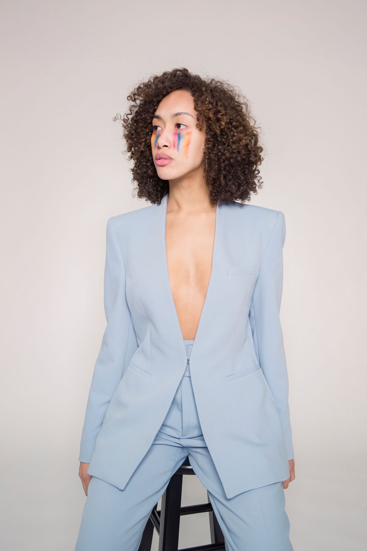 Woman wearing a powder blue suit