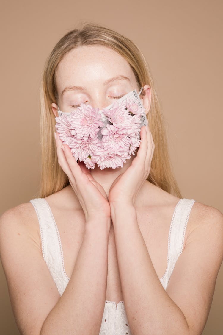 Serene Woman In Flower Mask