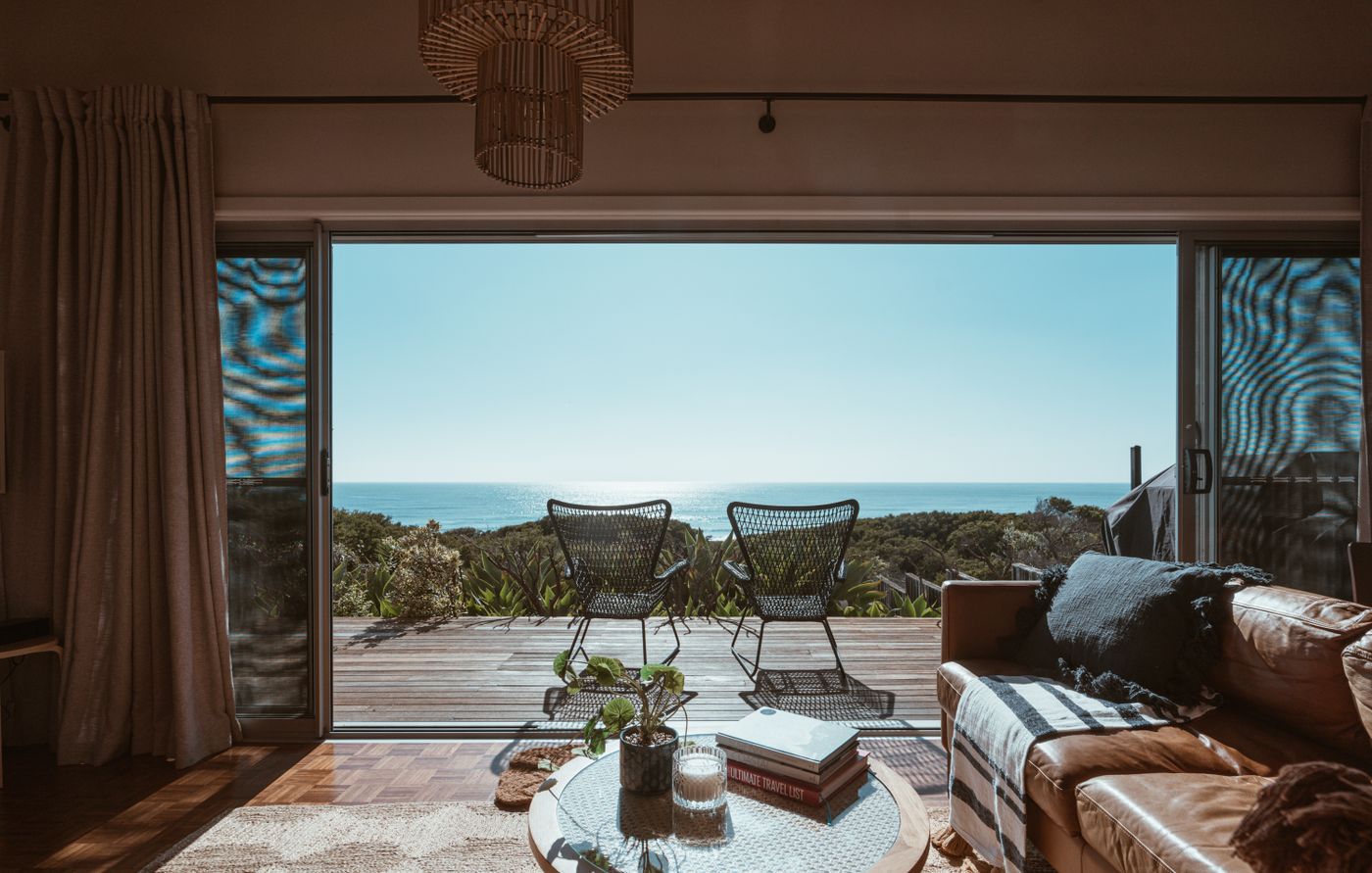 Terrace of a small coastal hotel overlooking the ocean