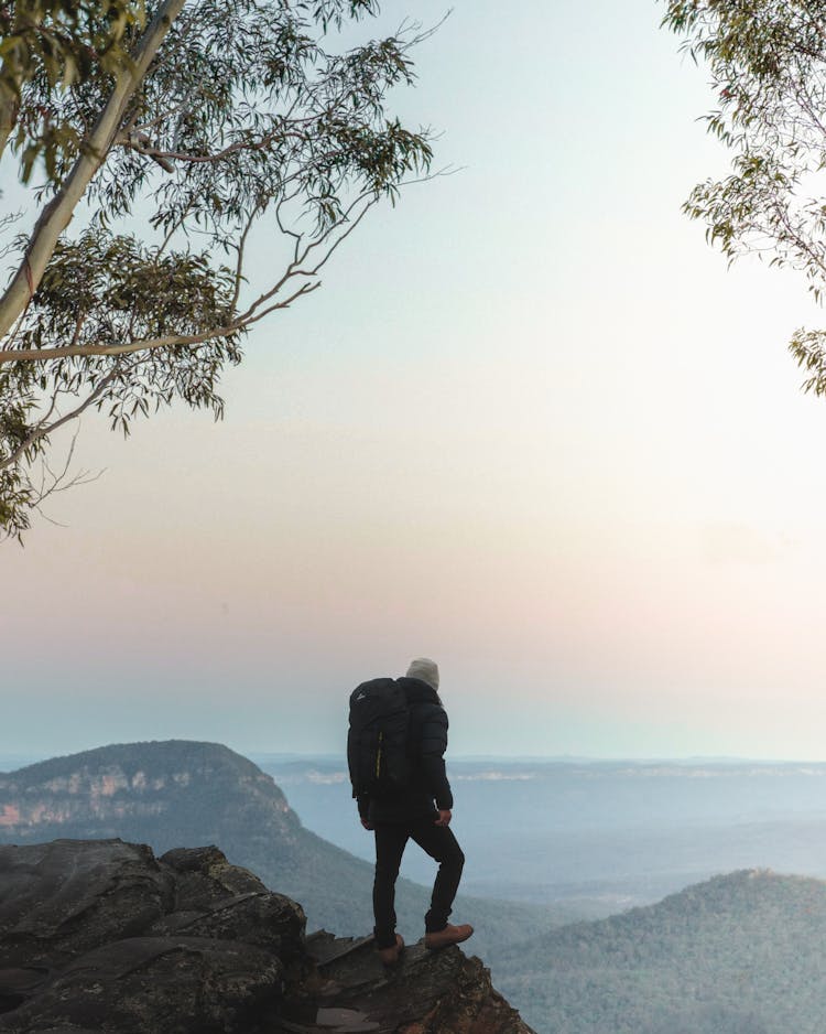 Hiker With Backpack Looking At The View