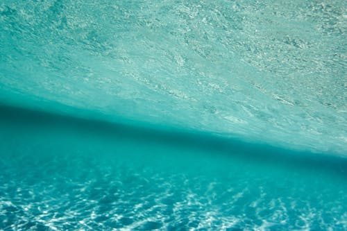 Bottom under blue ocean water