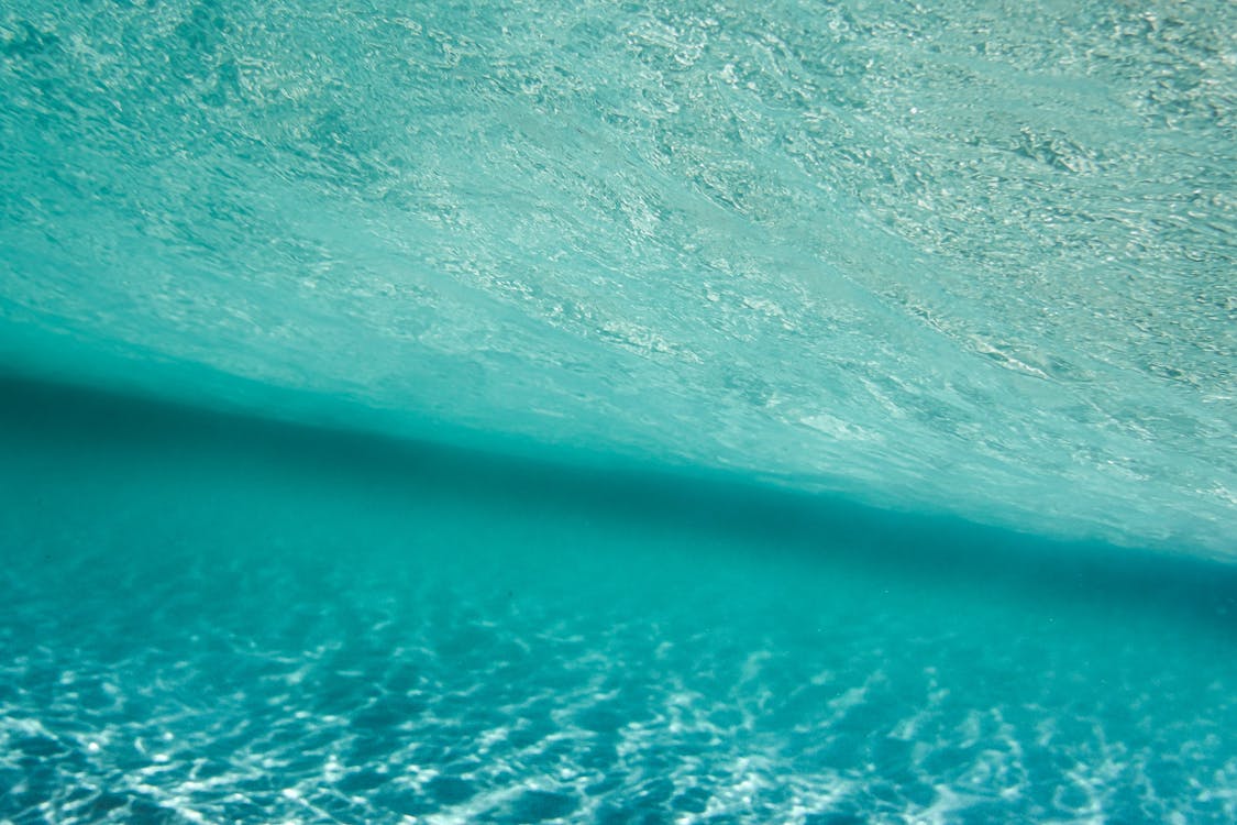 Bottom under blue ocean water