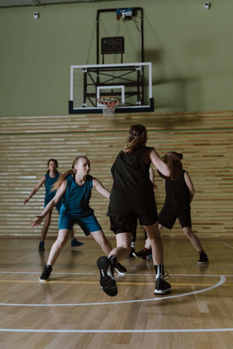 Women Playing Basketball