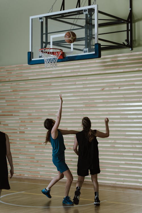 Women Playing Basketball