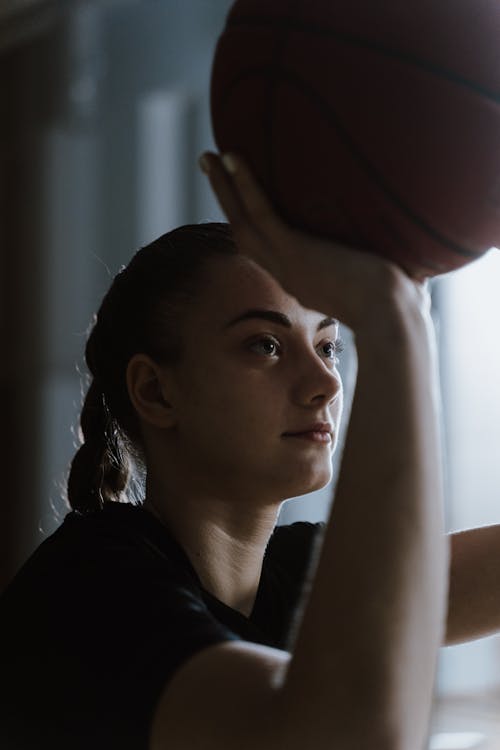 Girl Shooting a ball