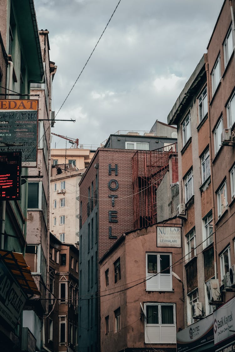 Old Residential Buildings And Hotel In Narrow Alley