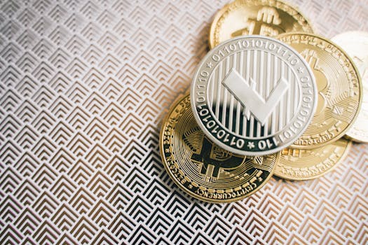 A detailed shot of Litecoin and Bitcoin coins on a geometric pattern background, highlighting digital currency.