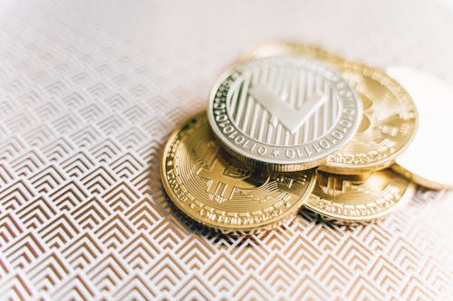 Free Stack of Golden Bitcoins in Close Up Photography Stock Photo