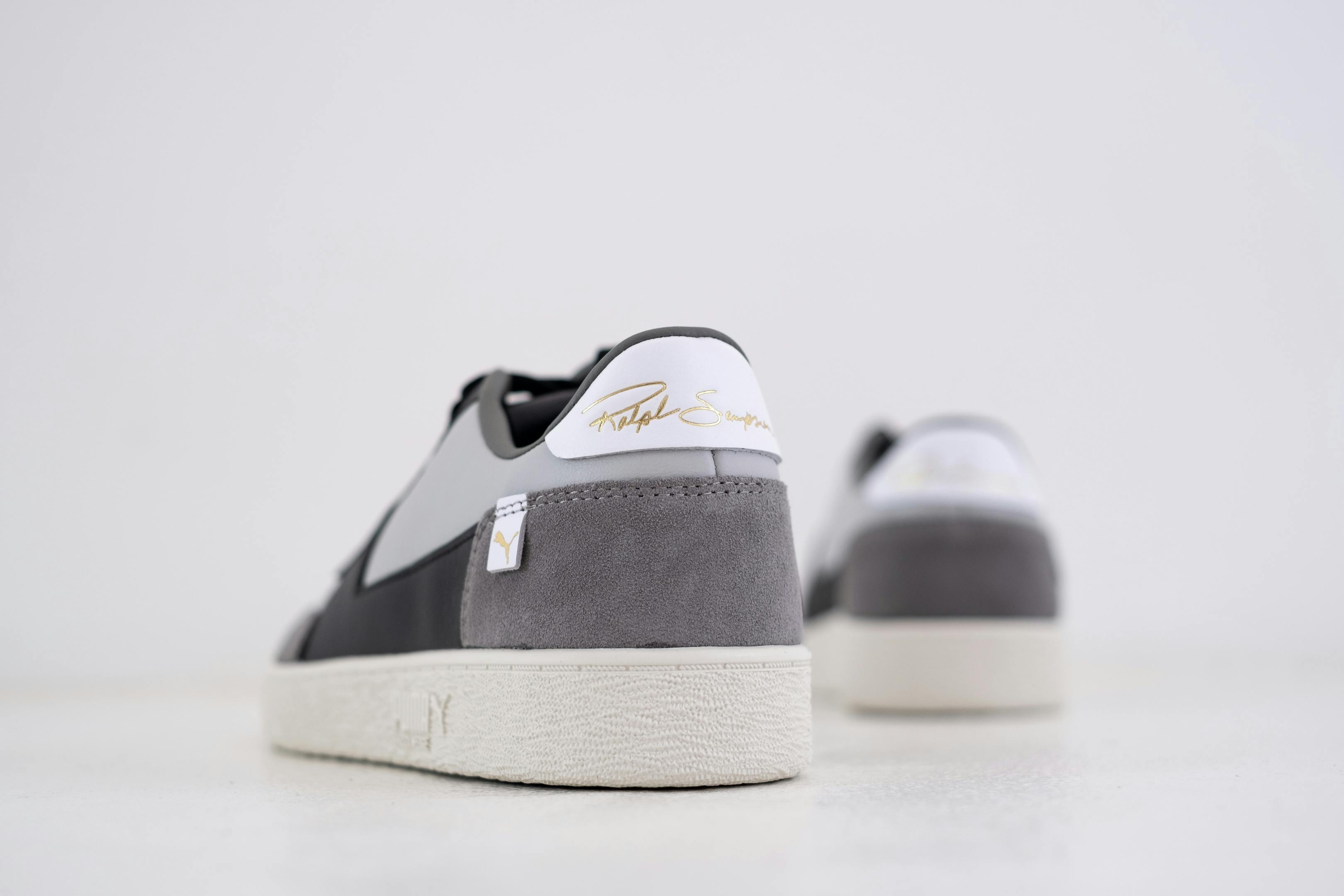 Close-Up Shot of Gray and White Shoes · Free Stock Photo