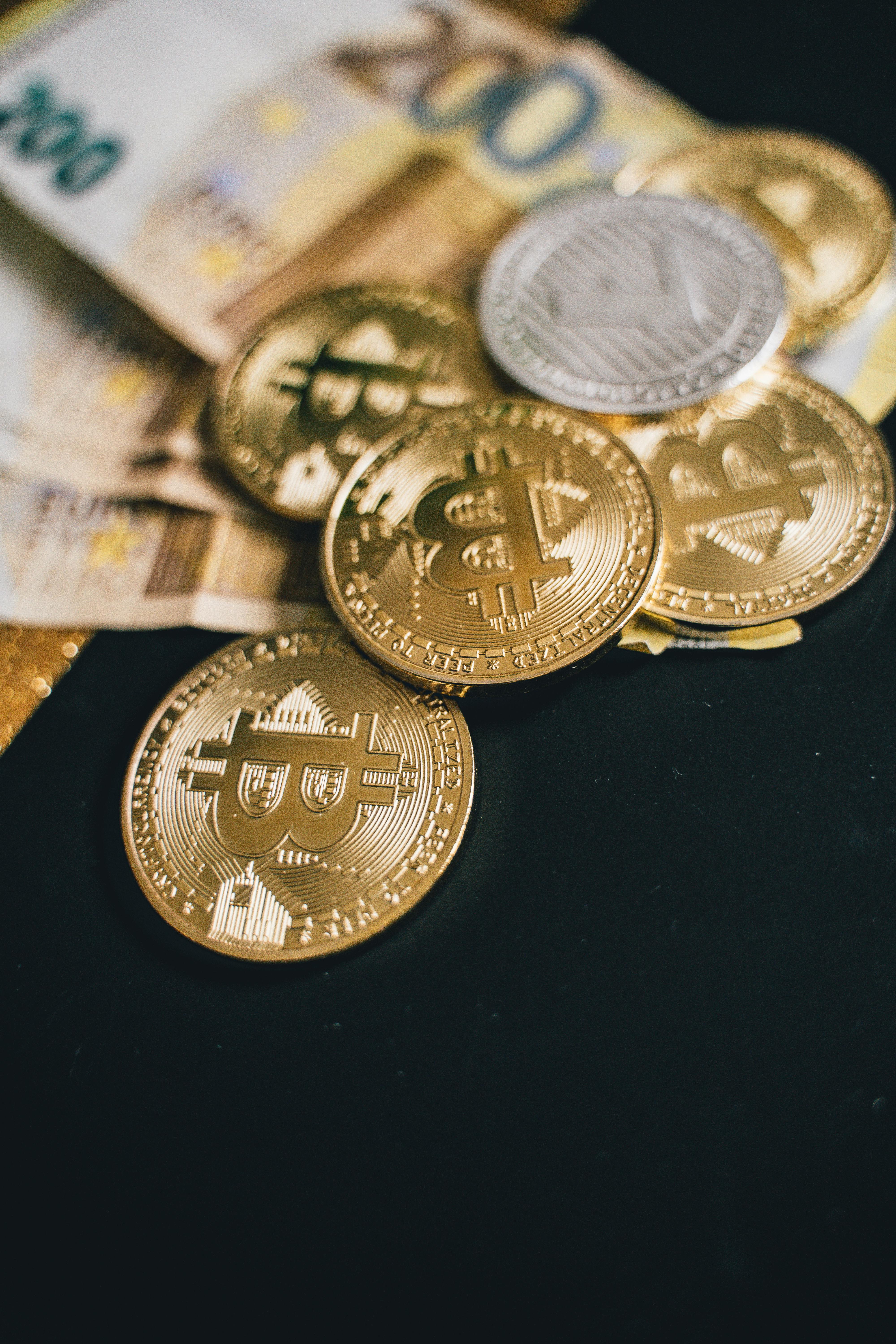 close up shot of coins and bills
