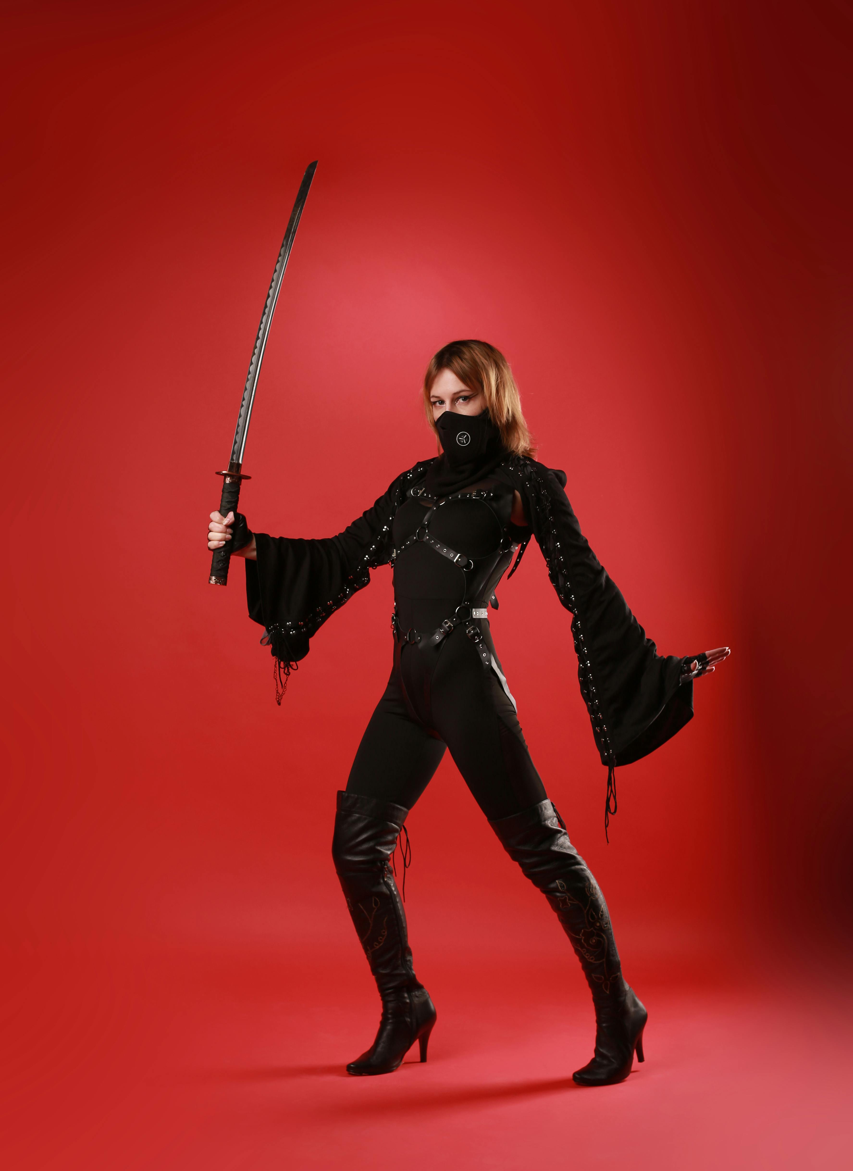 Warrior woman holding samurai sword , Katana with silhouette Stock  Illustration | Adobe Stock