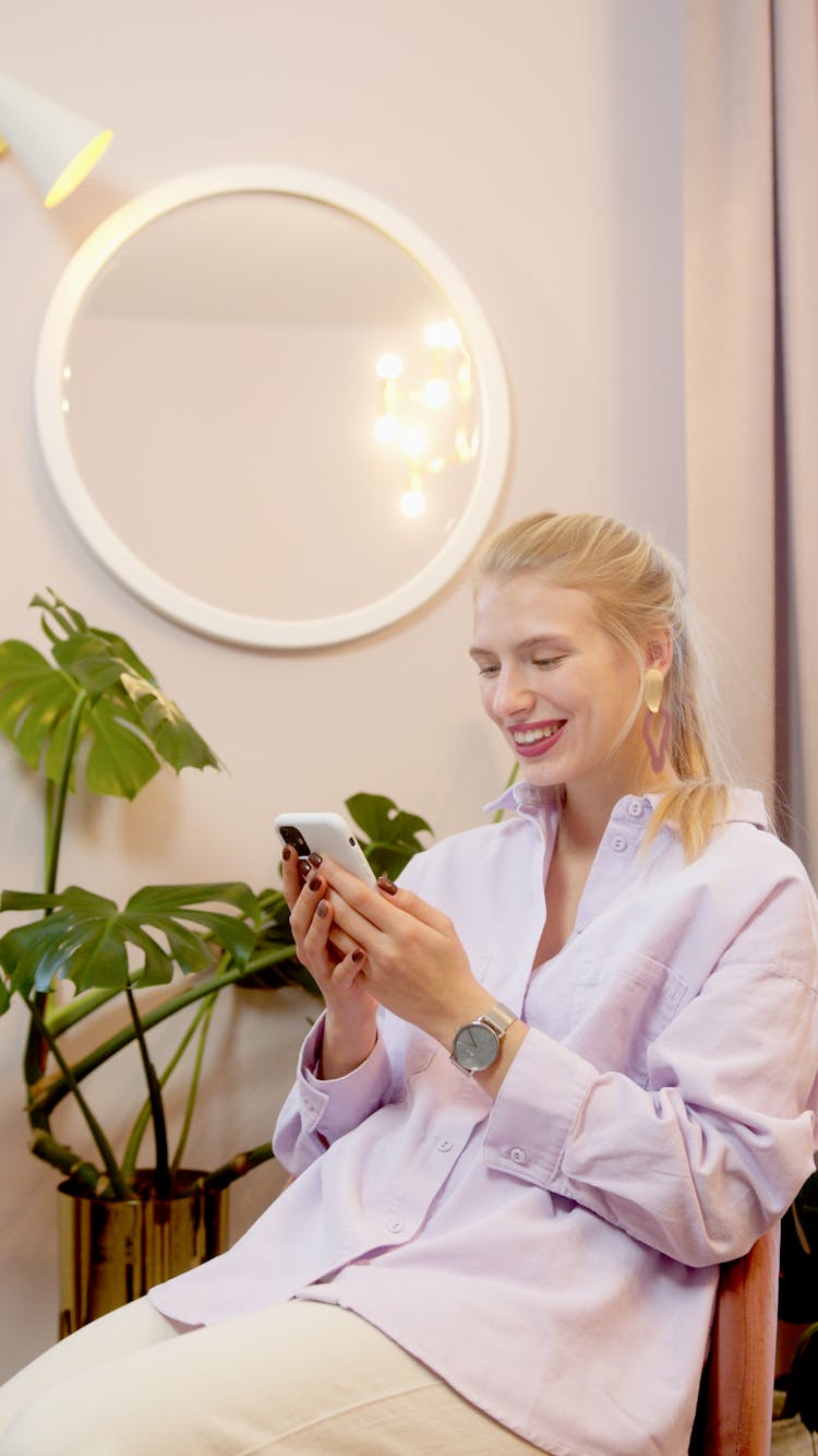 A Woman Using A Smartphone