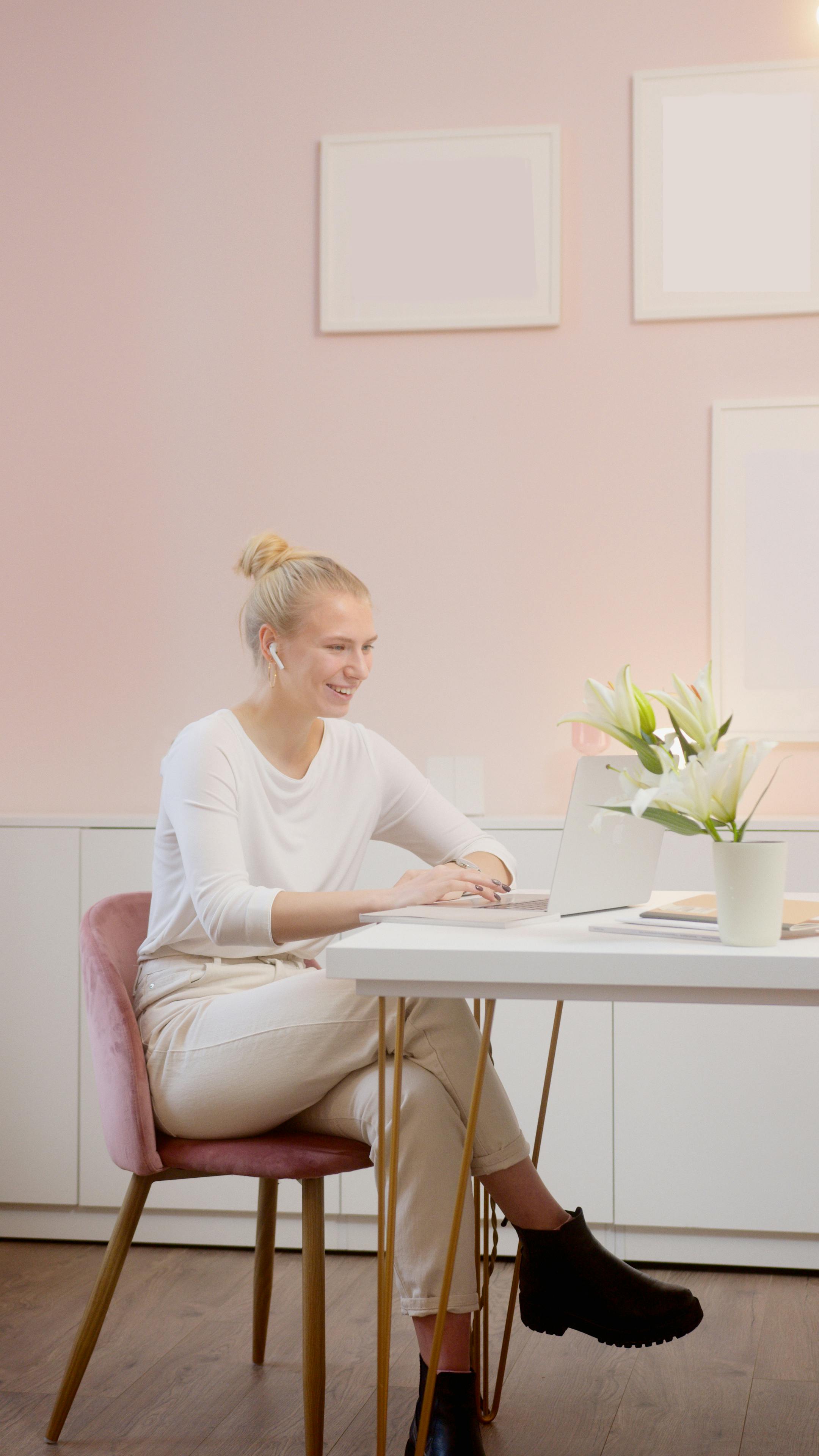 a woman using a laptop