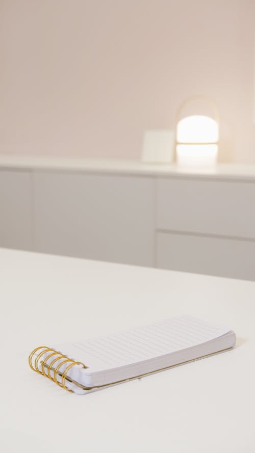 Notepad on White Surface