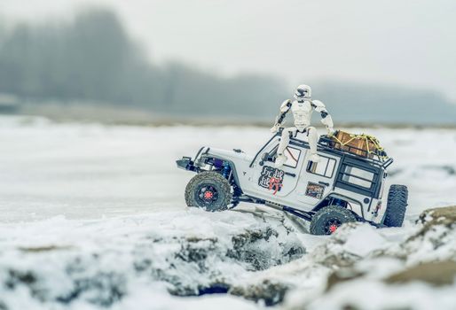 
A Scout Trooper Toy Sitting on an RC Off-Road Vehicle