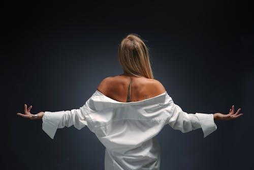 Free Back View of a Tattooed Woman Stock Photo