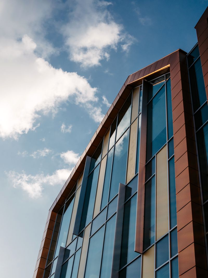 Representative photo of a residential building with glass windows