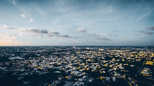 Aerial View of City Buildings Under Blue Sky