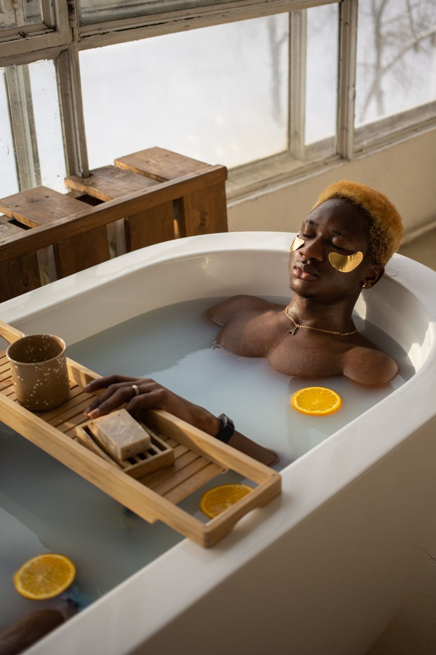 African man enjoying a calming spa wellness treatment