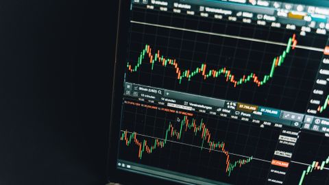 Close-up of a live cryptocurrency trading chart screen displaying dynamic market trends and analysis.
