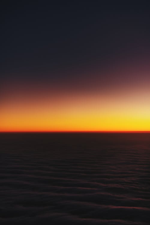 Безкоштовне стокове фото на тему «вертикальні постріл, горизонт, Захід сонця» стокове фото