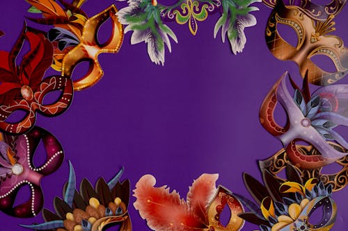 Mardi Gras Masks On Purple Background