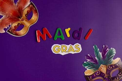 Mardi Gras Masks With Purple Background