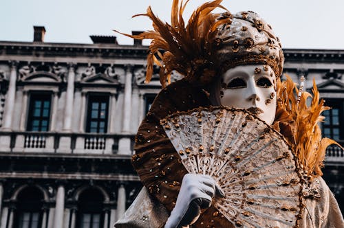 Free Person Wearing A Mask and Costume At Venice Carnival Stock Photo